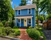 Two-story blue siding exterior with white trim Two-story blue siding exterior with white trim