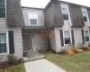 View of front of home featuring mansard roof and roof with shingles View of front of home featuring mansard roof and roof with shingles