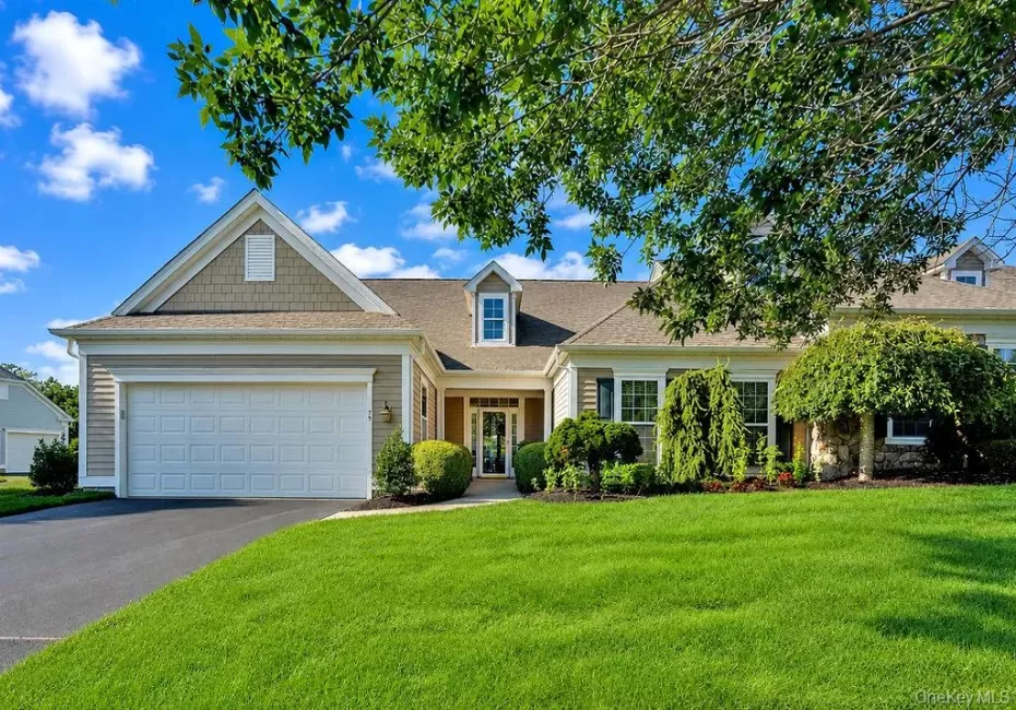 Welcoming front exterior with mature plantings Welcoming front exterior with mature plantings