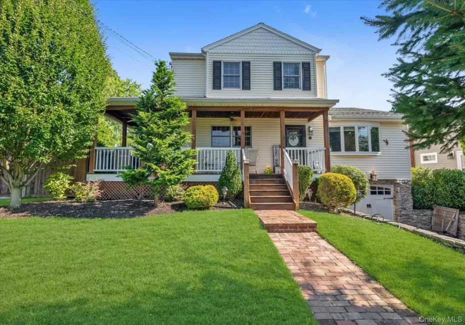 Large front yard with wrap around porch. Large front yard with wrap around porch.