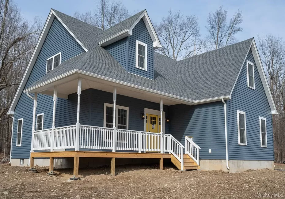 View of front of house with a large porch and roof with shingles View of front of house with a large porch and roof with shingles