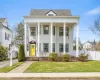 Front of home with grand columns and welcoming front door Front of home with grand columns and welcoming front door