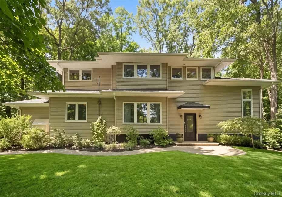A Frank Lloyd Wright-inspired Colonial Retreat, With Legal Apartment A Frank Lloyd Wright-inspired Colonial Retreat, With Legal Apartment