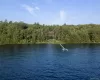 View of home from Toronto (Water is AI generated to show full level) View of home from Toronto (Water is AI generated to show full level)