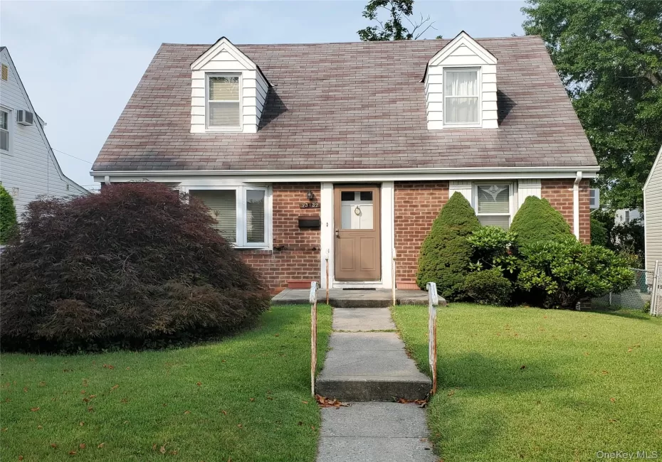 23-32 206th St Bayside. Front view - wide line Cape Cod style home. 23-32 206th St Bayside. Front view - wide line Cape Cod style home.