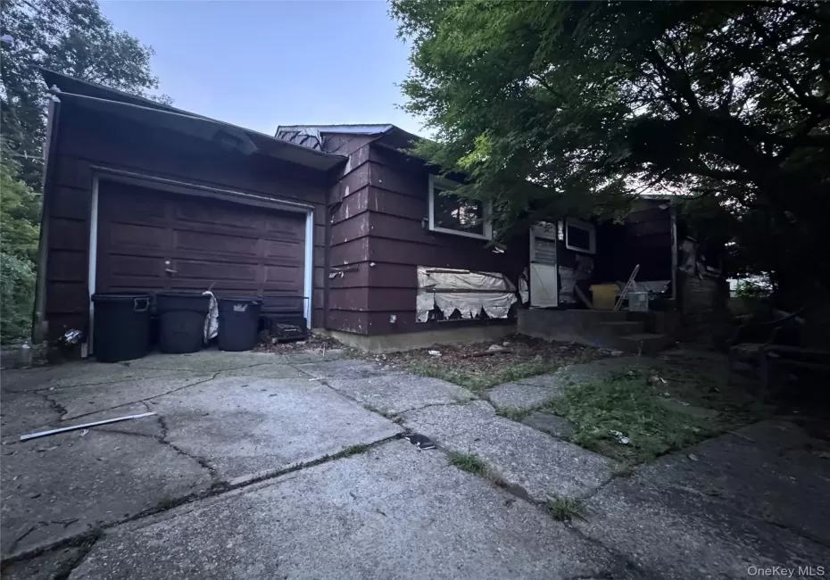 Current use of this almost 10,000 sf lot is a ranch in disrepair Current use of this almost 10,000 sf lot is a ranch in disrepair