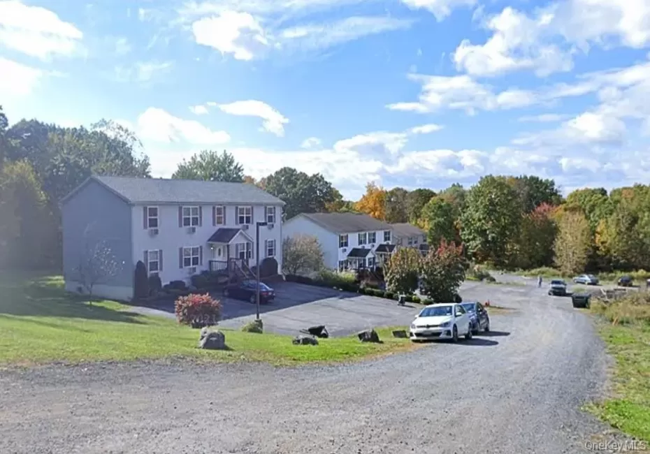 The middle unit of three, Unit 1 in on the left. Offering extra windows and a private back deck. The middle unit of three, Unit 1 in on the left. Offering extra windows and a private back deck.