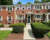 Brick facade i bedroom condo with rear outdoor space. Brick facade i bedroom condo with rear outdoor space.