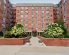 Brick facade building with multiple windows Brick facade building with multiple windows