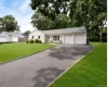 Lots of curb appeal, 3 bed and 1.5 bath ranch on culdesac block. Ready to move right in. AI used to brighten grass. Lots of curb appeal, 3 bed and 1.5 bath ranch on culdesac block. Ready to move right in. AI used to brighten grass.