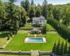 a historic country estate on 17.9 private acres with pool, terraced gardens and expansive level lawns. a historic country estate on 17.9 private acres with pool, terraced gardens and expansive level lawns.