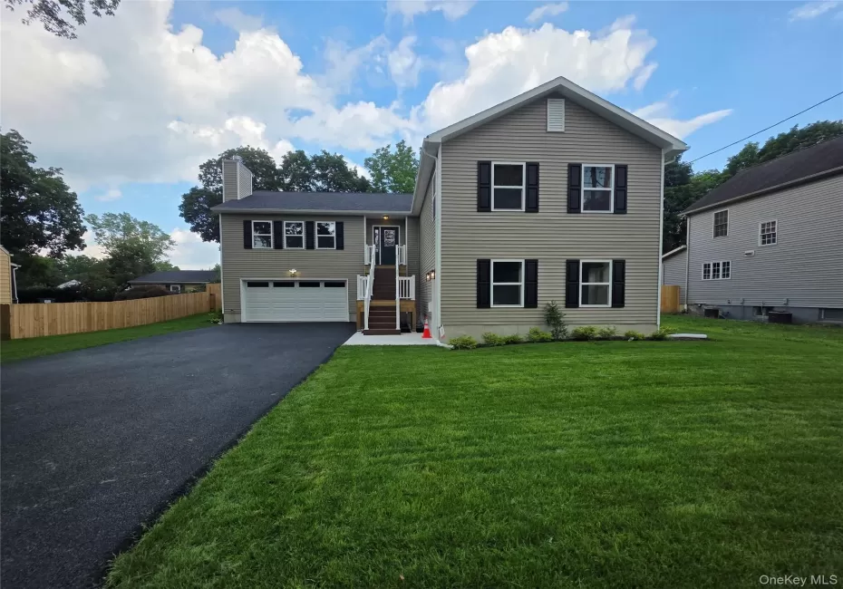 With newly laid Sod and NEW Macadam Driveway! With newly laid Sod and NEW Macadam Driveway!