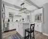 Bright and airy kitchen with white cabinetry and stainless steel appliances Bright and airy kitchen with white cabinetry and stainless steel appliances