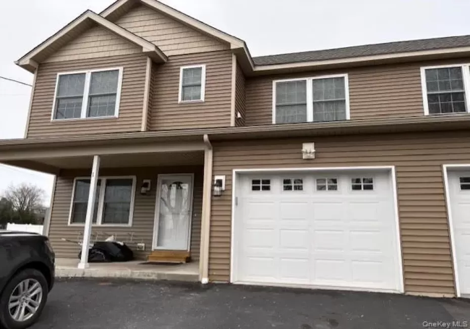 Two-story facade with horizontal siding and shake accents Two-story facade with horizontal siding and shake accents