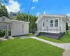 Front porch, lush front yard, and a private storage unit! Front porch, lush front yard, and a private storage unit!