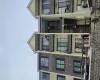 View of apartment building / complex featuring stairs View of apartment building / complex featuring stairs