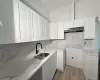 A Kitchen has quartz counters A Kitchen has quartz counters