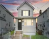 View of front of house with a fenced front yard and entry steps View of front of house with a fenced front yard and entry steps