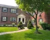 Hollis Court front of unit brick and a front lawn Hollis Court front of unit brick and a front lawn