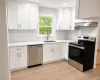 New Eat-in- Kitchen with Quartz Counter Top New Eat-in- Kitchen with Quartz Counter Top
