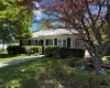 Ranch-style house with a front yard Ranch-style house with a front yard