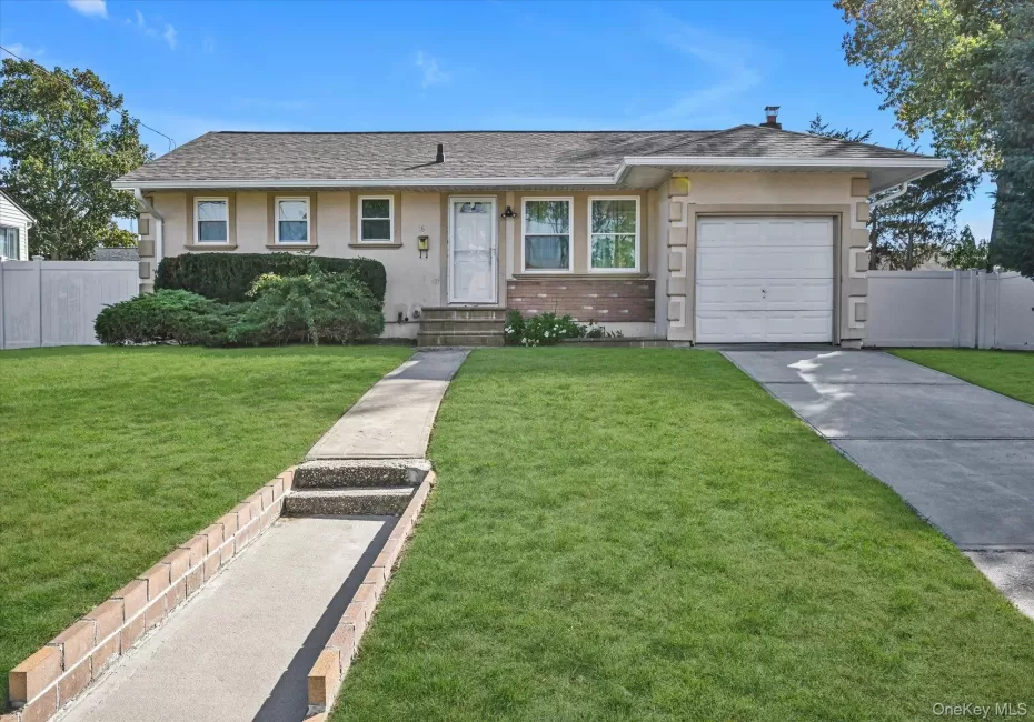 Ranch-style home featuring an attached garage, stucco siding, driveway, and roof with shingles Ranch-style home featuring an attached garage, stucco siding, driveway, and roof with shingles
