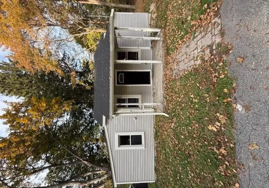 View of front of house with a porch and roof with shingles View of front of house with a porch and roof with shingles