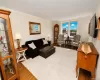 The Oversized Living Room has sunny Southern exposures, gleaming hardwood floors and opens to the entry foyer. The living room is approx 19'-1" x 12'-10. and entry foyer is an approx. additional 12'-10" x 6'-3" The Oversized Living Room has sunny Southern exposures, gleaming hardwood floors and opens to the entry foyer. The living room is approx 19'-1" x 12'-10. and entry foyer is an approx. additional 12'-10" x 6'-3"