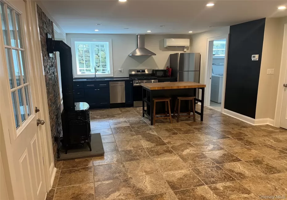 Open floor plan kitchen/living areas Open floor plan kitchen/living areas