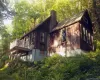 Beautiful view of home up on a small hill. So private Beautiful view of home up on a small hill. So private