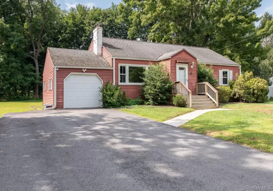 New driveway, new garage door, new walkway, new entry stairs New driveway, new garage door, new walkway, new entry stairs