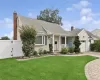 Siding exterior with a covered porch, bay window, and attached garage Siding exterior with a covered porch, bay window, and attached garage