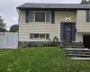 Doorway to property with roof with shingles Doorway to property with roof with shingles