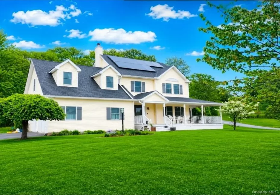 Inviting Colonial with wrap-around front Porch at the end of a cul-de-sac on over an acre Inviting Colonial with wrap-around front Porch at the end of a cul-de-sac on over an acre