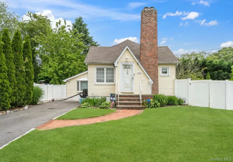 View of front of home with a chimney, roof with shingles, a gate, and entry steps View of front of home with a chimney, roof with shingles, a gate, and entry steps