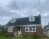 Brick facade with white window frames Brick facade with white window frames