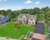 Welcome to your FOREVER home! A commuters dream, under 5 miles to Metro North train just 75 miles from Manhattan, this magnificent custom Colonial stands as the crown jewel of the community. The property welcomes you with an expansive driveway graced by an elegant stone apron, making a distinct first impression as you arrive. Set on a glorious one-acre lot, every detail has been designed for luxury living and exceptional entertaining Welcome to your FOREVER home! A commuters dream, under 5 miles to Metro North train just 75 miles from Manhattan, this magnificent custom Colonial stands as the crown jewel of the community. The property welcomes you with an expansive driveway graced by an elegant stone apron, making a distinct first impression as you arrive. Set on a glorious one-acre lot, every detail has been designed for luxury living and exceptional entertaining