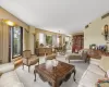 Sun-filled iving and dining areas with 2 sets of glass doors to wrap around balcony. Sun-filled iving and dining areas with 2 sets of glass doors to wrap around balcony.