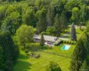 Raised ranch with inground pool on over 2 acres of private grounds Raised ranch with inground pool on over 2 acres of private grounds