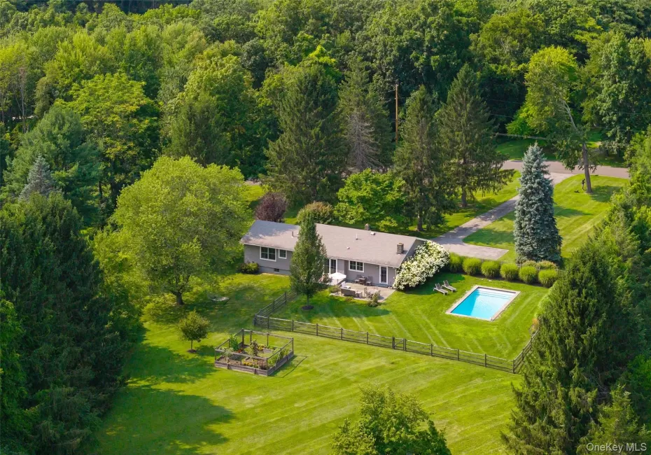 Raised ranch with inground pool on over 2 acres of private grounds Raised ranch with inground pool on over 2 acres of private grounds