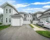 704 Fenway driveway is to the right of garage 704 Fenway driveway is to the right of garage