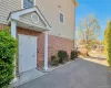 Entrance to property with brick siding Entrance to property with brick siding