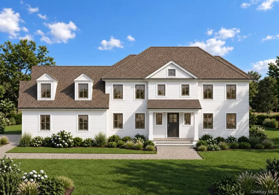 Traditional coastal home with front porch. White plank siding exterior with dormer and windows Traditional coastal home with front porch. White plank siding exterior with dormer and windows