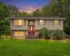 Residence featuring stone and siding facade Residence featuring stone and siding facade