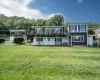 A large driveway leads to the ground level apartment overlooking Greenwood Lake & Sterling Forest. A large driveway leads to the ground level apartment overlooking Greenwood Lake & Sterling Forest.