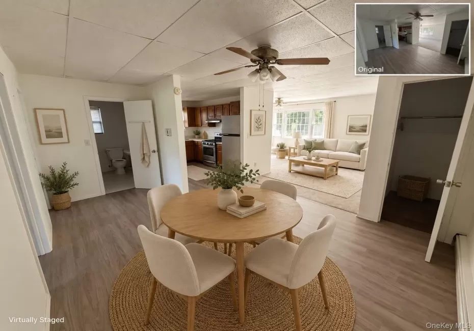 Wood-finish flooring throughout, a ceiling fan with integrated lighting, and multiple windows providing natural light Wood-finish flooring throughout, a ceiling fan with integrated lighting, and multiple windows providing natural light