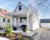 Rear view of house with a garage and an outdoor structure Rear view of house with a garage and an outdoor structure