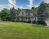 A beautiful home, this photo BEFORE the brand new path, new front staircase, and freshly trimmed specimen trees.t A beautiful home, this photo BEFORE the brand new path, new front staircase, and freshly trimmed specimen trees.t