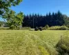 View of grassy yard with a view of countryside View of grassy yard with a view of countryside