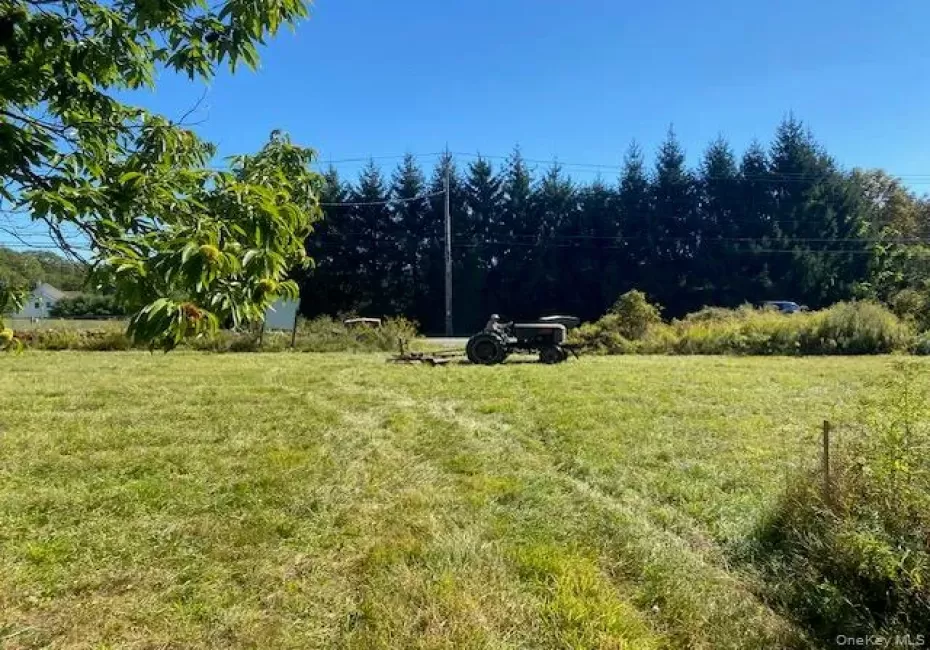 View of grassy yard with a view of countryside View of grassy yard with a view of countryside